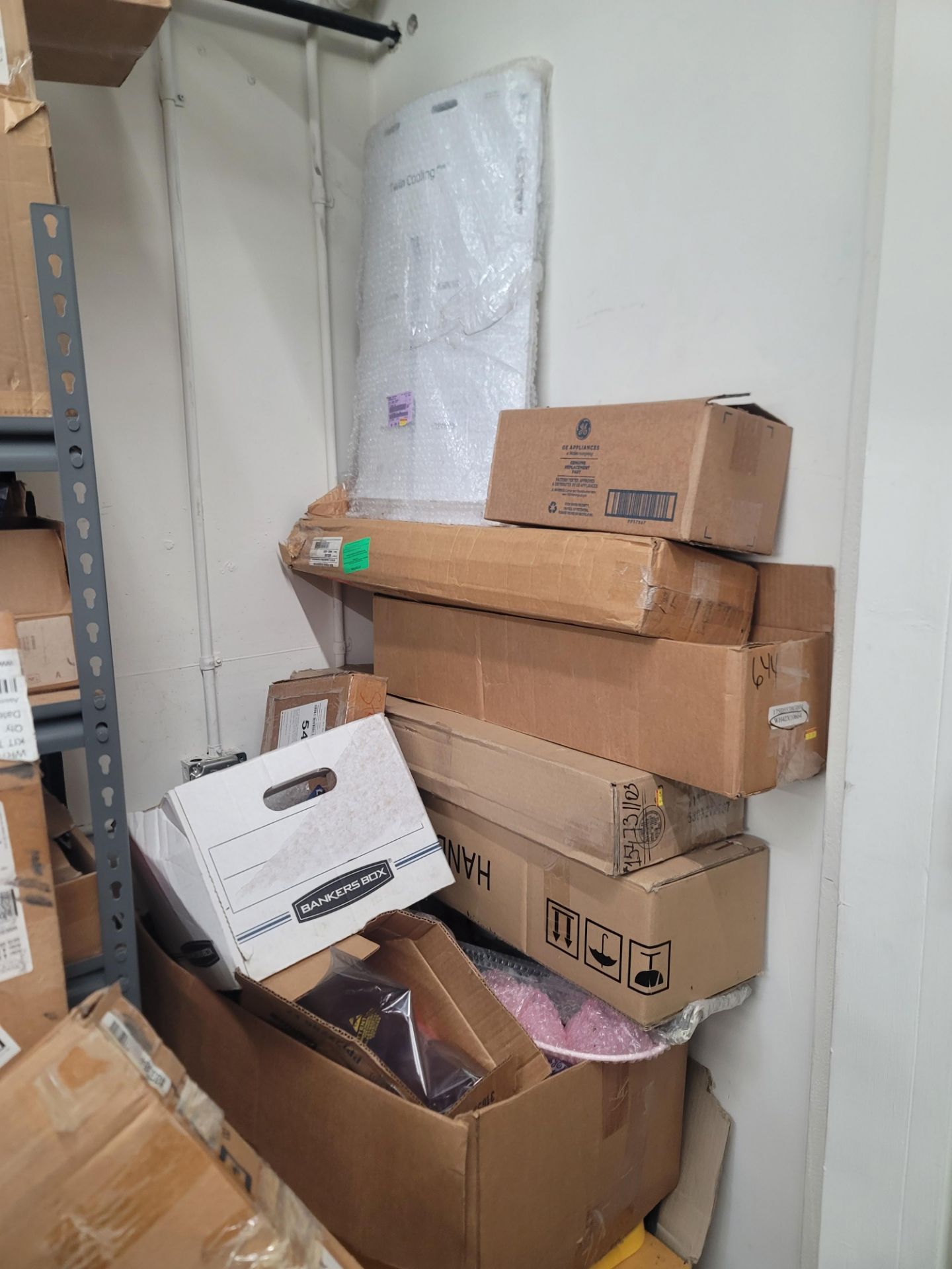 LOT - CONTENTS OF CORNER AREA, TO INCLUDE SHELF UNIT FULL OF APPLIANCE REPLACEMENT PARTS AND ALL - Image 10 of 21