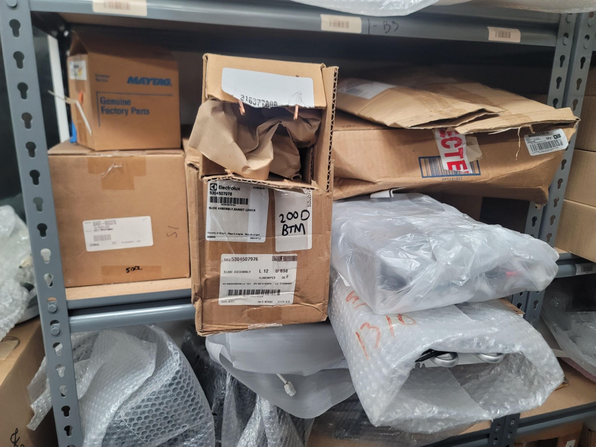 LOT - ALL ITEMS ON WALL INCLUDING CORNER, W/ (2) SHELF UNITS FILLED W/ APPLIANCE REPLACEMENT PARTS - Image 6 of 15