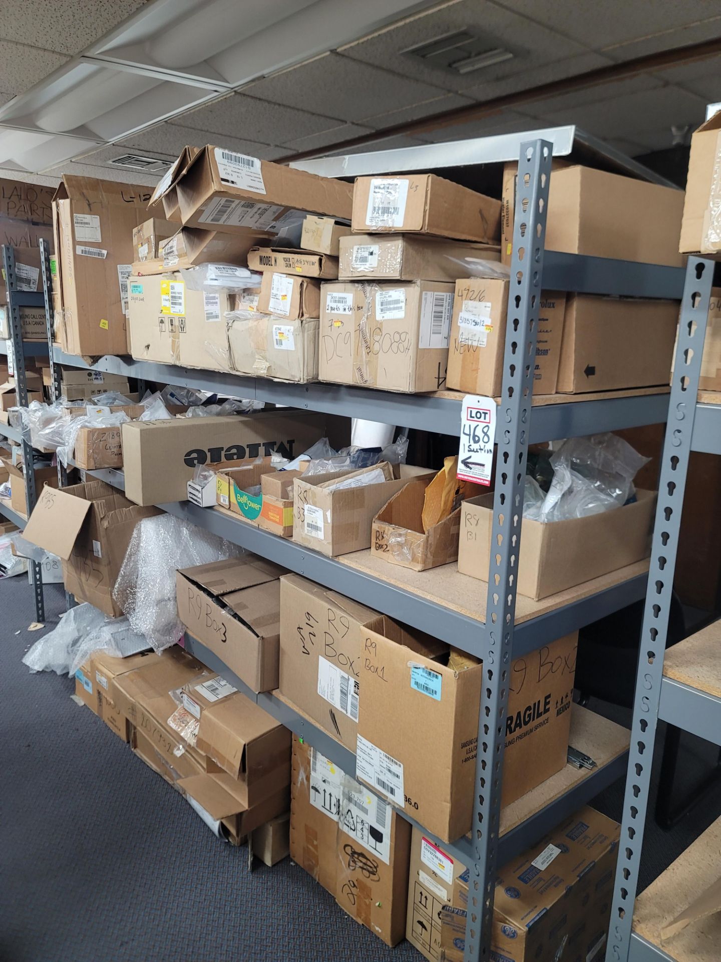 LOT - 8' SHELF UNIT W/ CONTENTS OF APPLIANCE REPLACEMENT PARTS