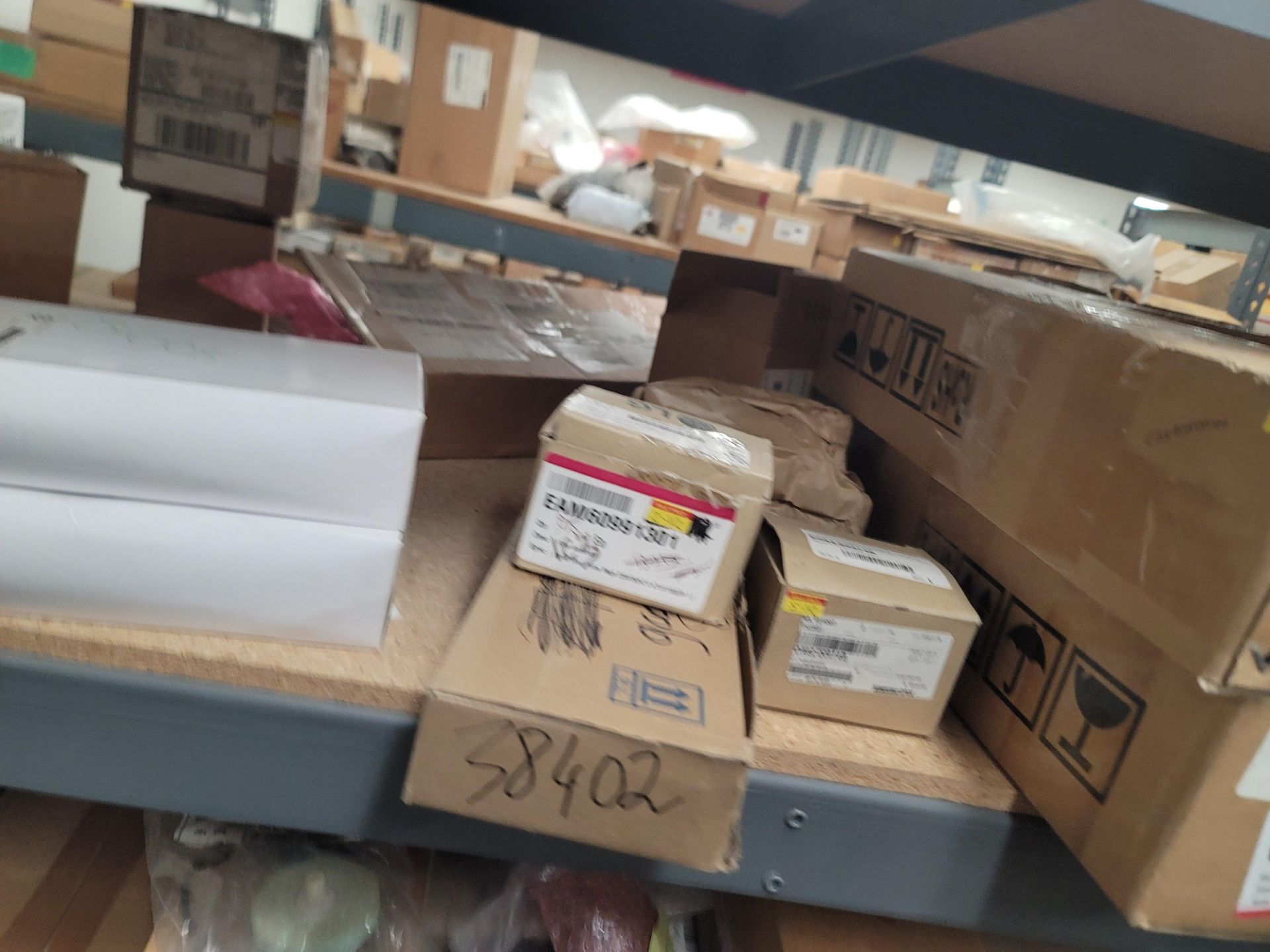 LOT - 8' SHELF UNIT W/ CONTENTS OF APPLIANCE REPLACEMENT PARTS - Image 9 of 33