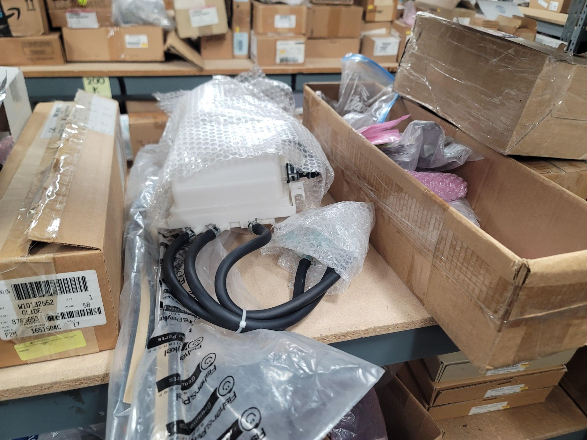 LOT - 8' SHELF UNIT W/ CONTENTS OF APPLIANCE REPLACEMENT PARTS - Image 8 of 19