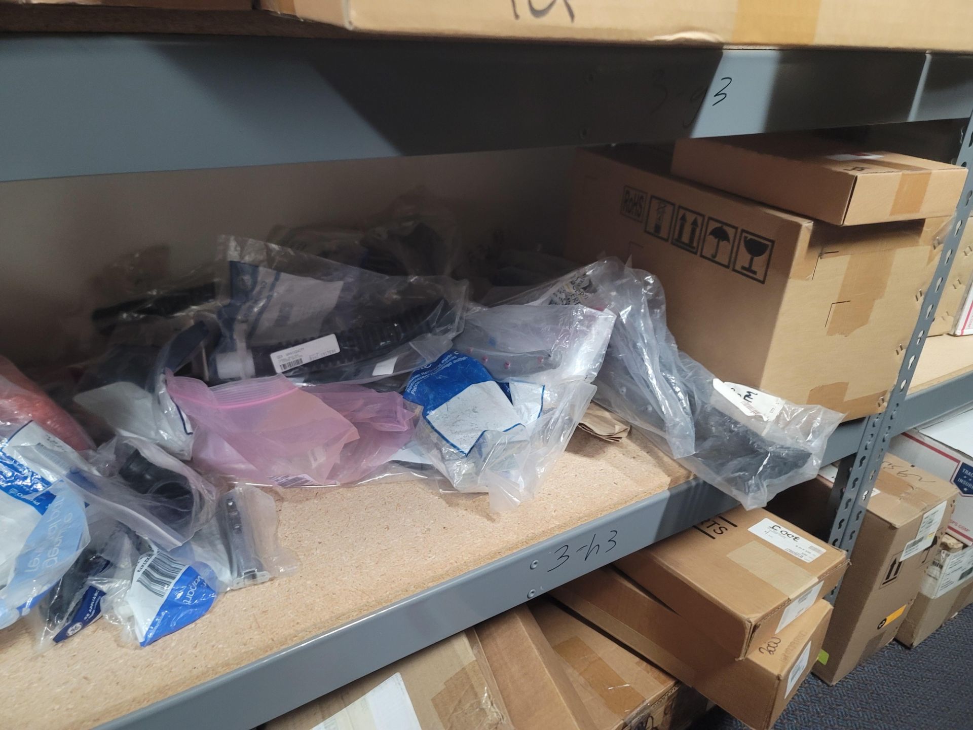 LOT - 8' SHELF UNIT W/ CONTENTS OF APPLIANCE REPLACEMENT PARTS - Image 17 of 23