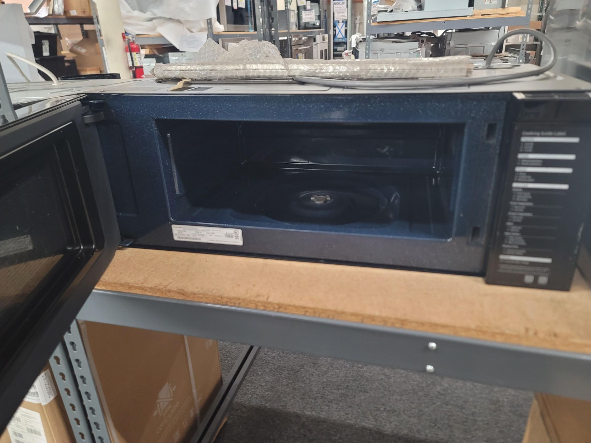 SAMSUNG 30" SLIM OVER-THE-RANGE SMART MICROWAVE OVEN IN STAINLESS STEEL, 1.1 CU. FT. CAPACITY, MODEL - Image 3 of 4