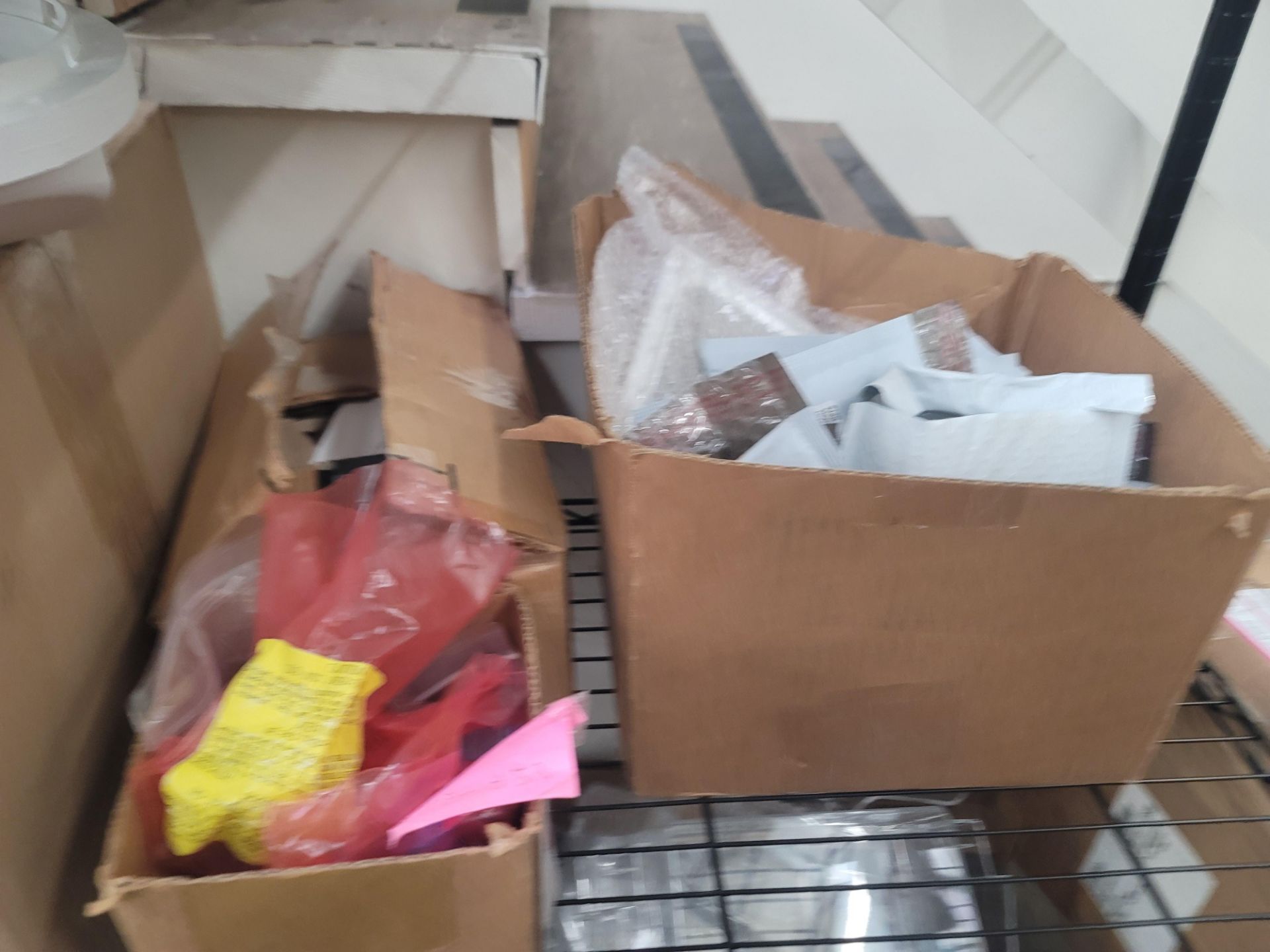 LOT - WIRE SHELF W/ CONTENTS AND LARGE BOX TO THE RIGHT TO INCLUDE APPLIANCE REPLACEMENT PARTS - Image 8 of 10