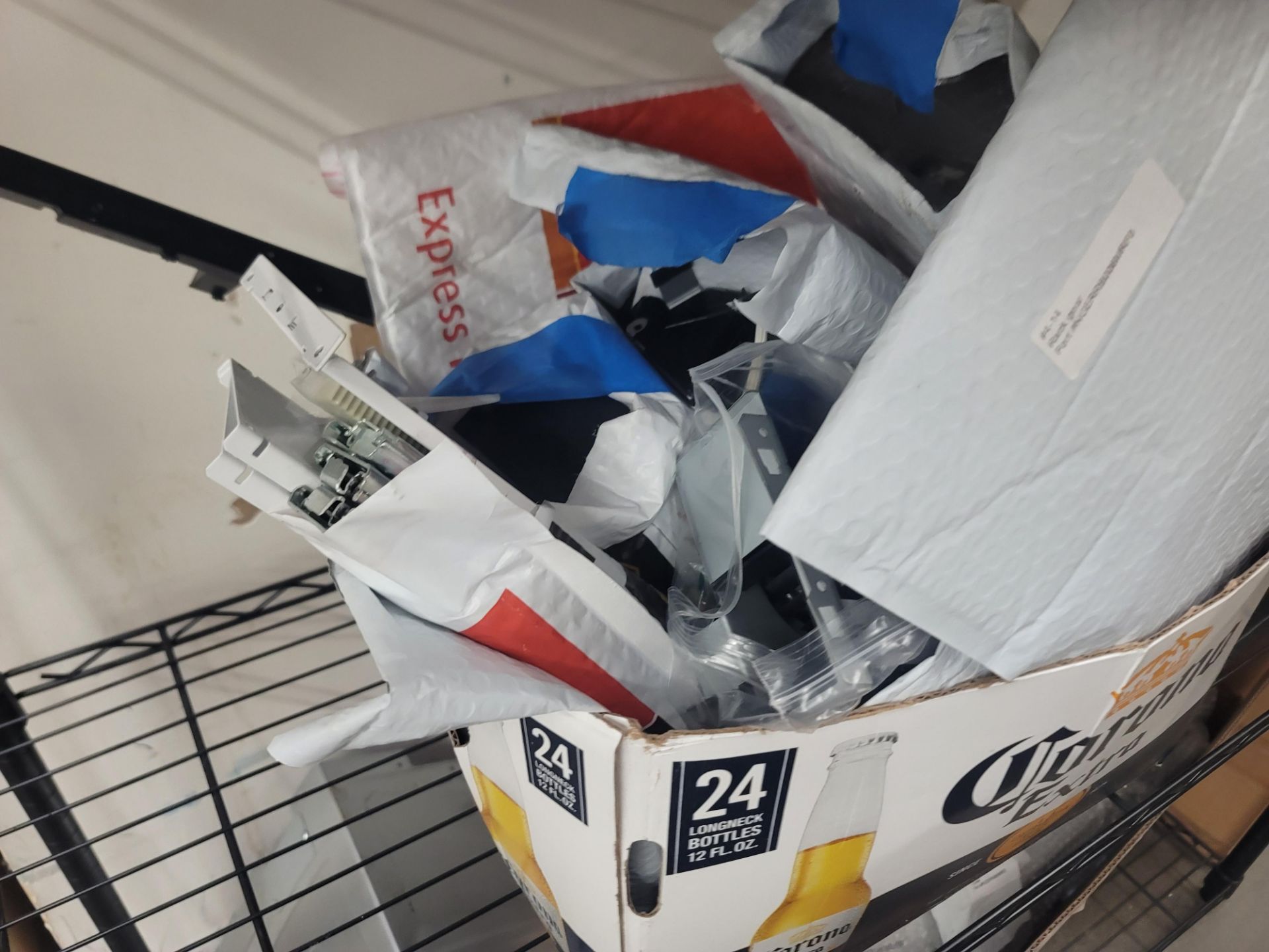 LOT - WIRE SHELF W/ CONTENTS AND LARGE BOX TO THE RIGHT TO INCLUDE APPLIANCE REPLACEMENT PARTS - Image 6 of 10