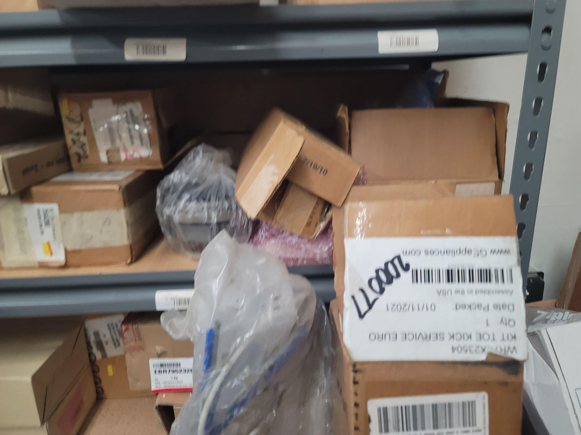 LOT - CONTENTS OF CORNER AREA, TO INCLUDE SHELF UNIT FULL OF APPLIANCE REPLACEMENT PARTS AND ALL - Image 17 of 21