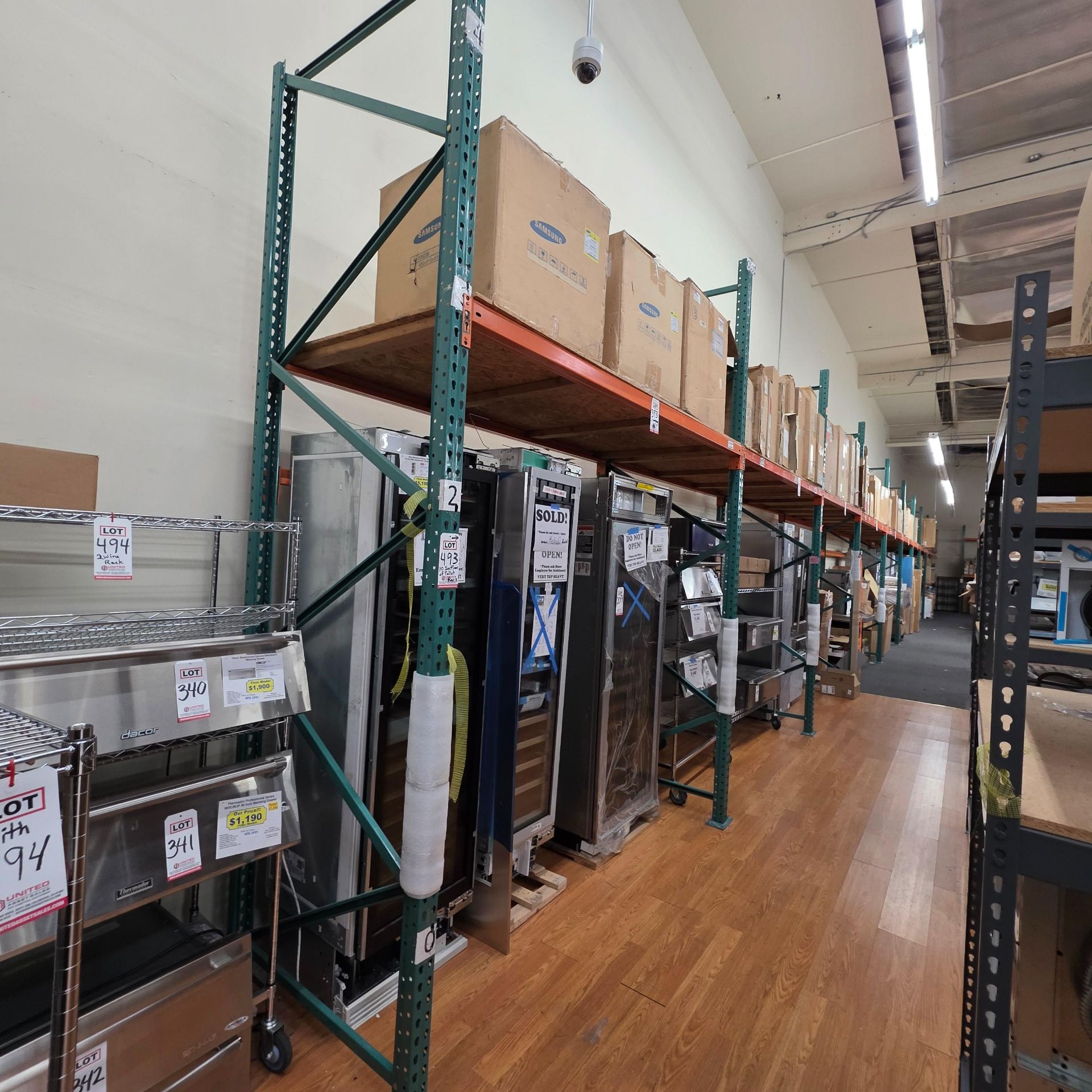 LOT - (10) 8' SECTIONS OF PALLET RACKING, APPROX. 8'-6" X 42" X 12" HT., PLYWOOD DECKING, CONTENTS