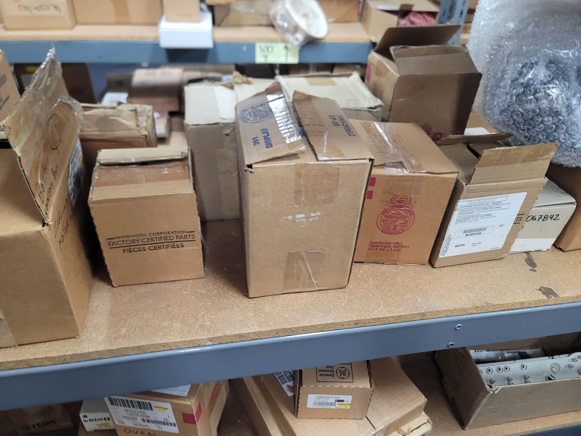 LOT - 8' SHELF UNIT W/ CONTENTS OF APPLIANCE REPLACEMENT PARTS - Image 10 of 18