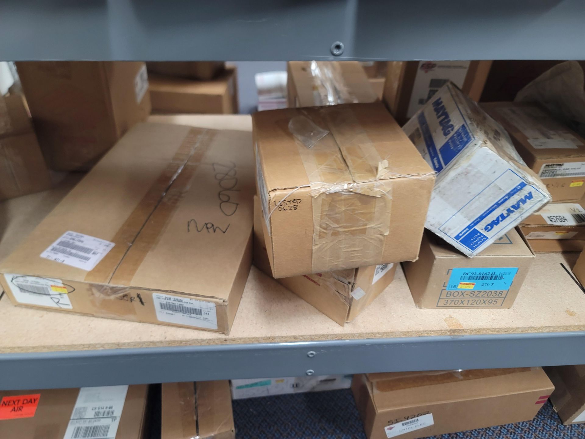 LOT - 8' SHELF UNIT W/ CONTENTS OF APPLIANCE REPLACEMENT PARTS - Image 16 of 33