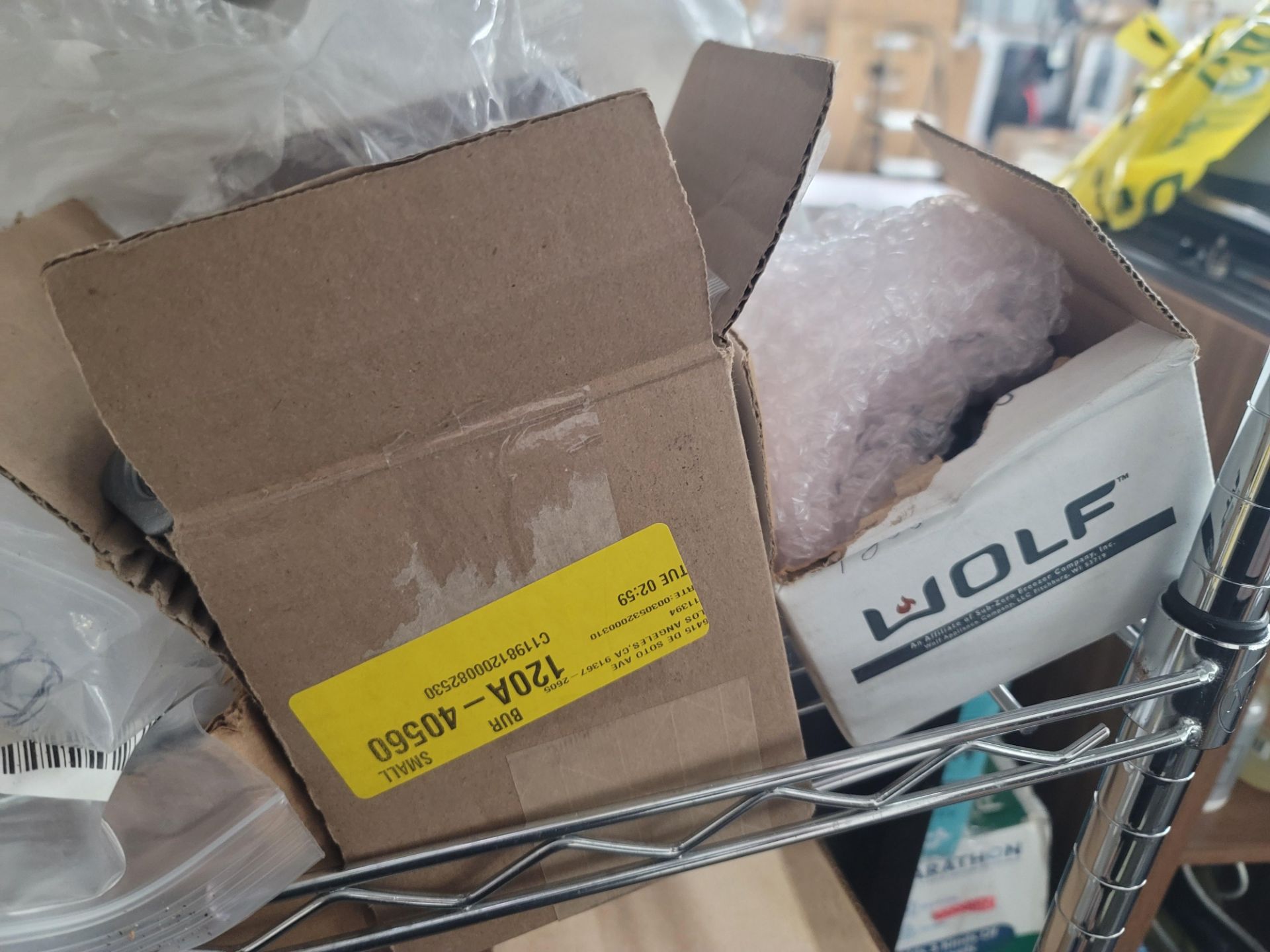 LOT - WIRE SHELF ON CASTERS, W/ CONTENTS OF APPLIANCE REPLACEMENT PARTS - Image 8 of 10