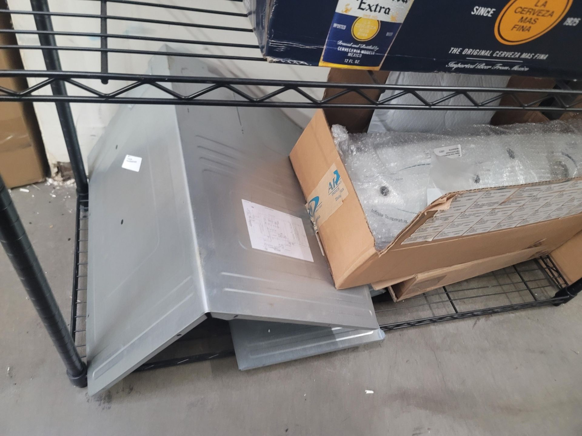 LOT - WIRE SHELF W/ CONTENTS AND LARGE BOX TO THE RIGHT TO INCLUDE APPLIANCE REPLACEMENT PARTS - Image 3 of 10