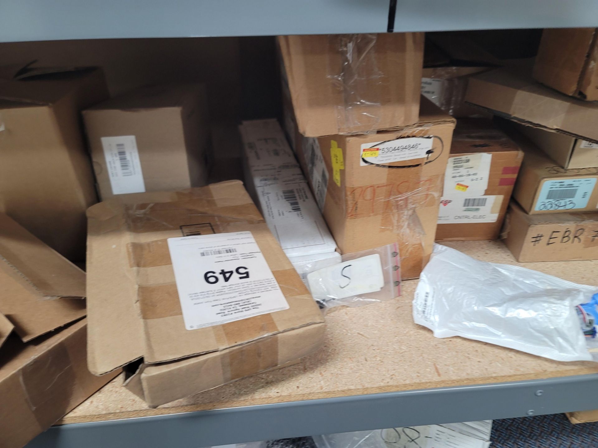 LOT - 8' SHELF UNIT W/ CONTENTS OF APPLIANCE REPLACEMENT PARTS - Image 13 of 19