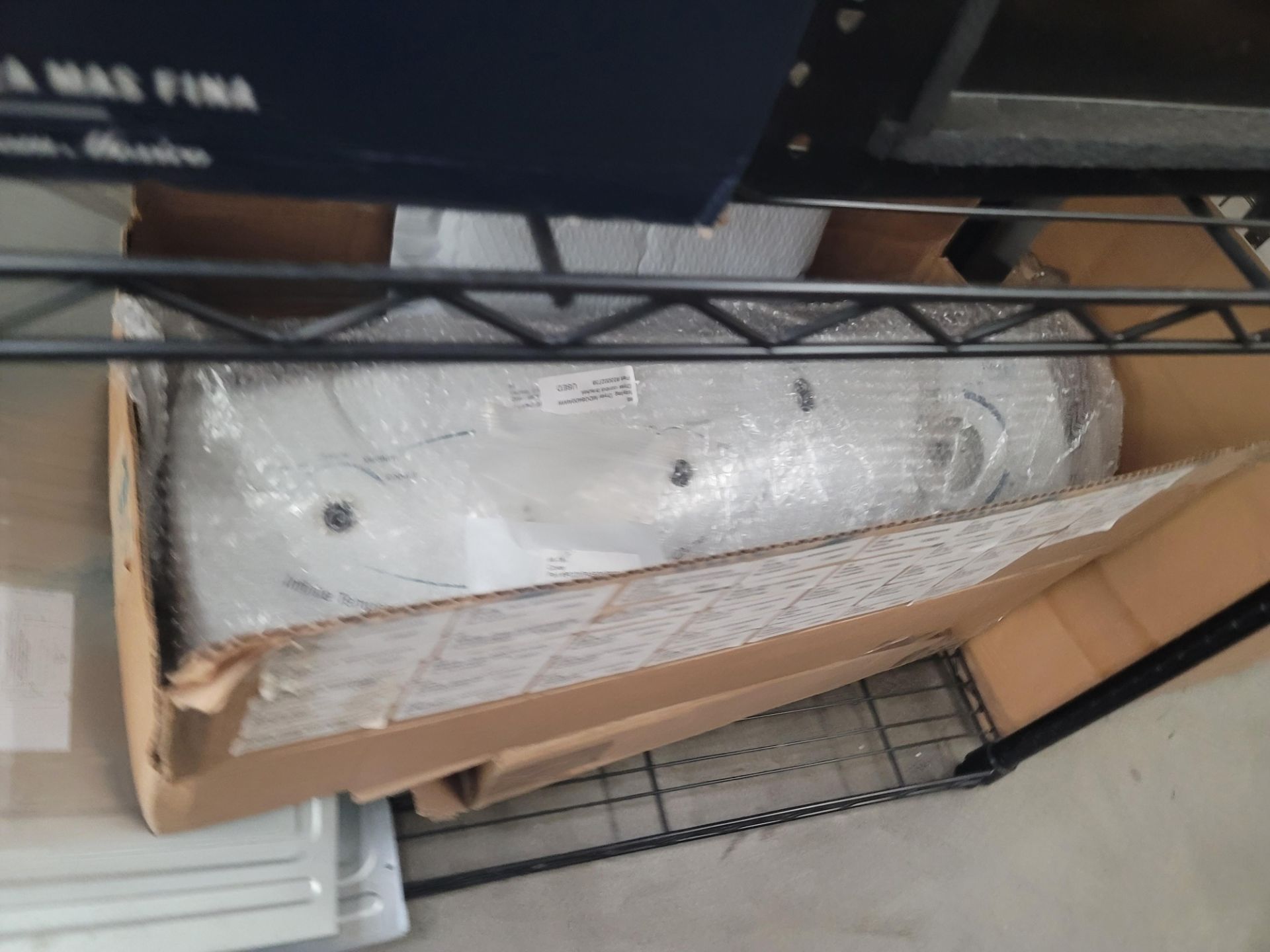 LOT - WIRE SHELF W/ CONTENTS AND LARGE BOX TO THE RIGHT TO INCLUDE APPLIANCE REPLACEMENT PARTS - Image 4 of 10