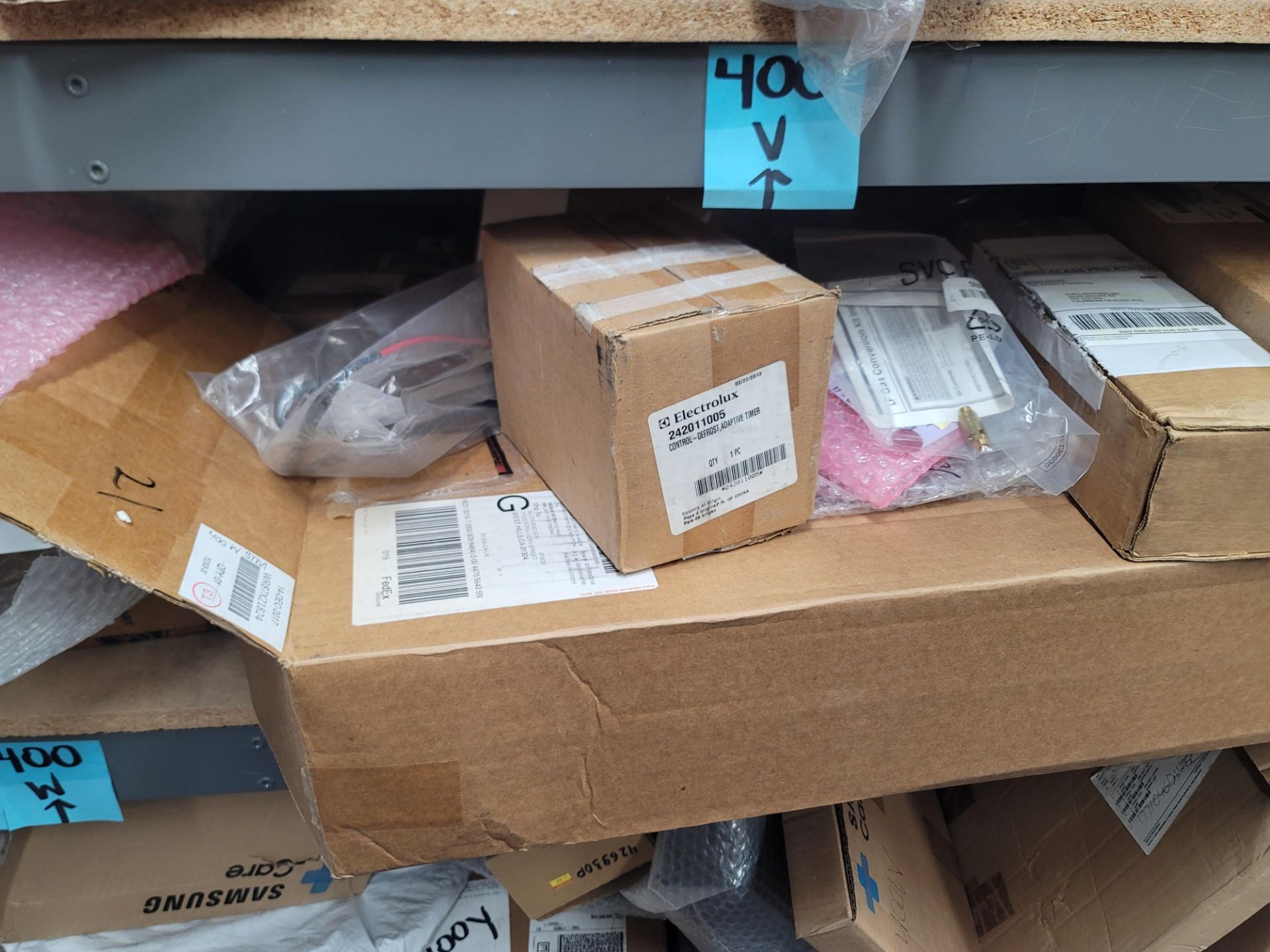 LOT - 8' SHELF UNIT W/ CONTENTS OF APPLIANCE REPLACEMENT PARTS - Image 10 of 16