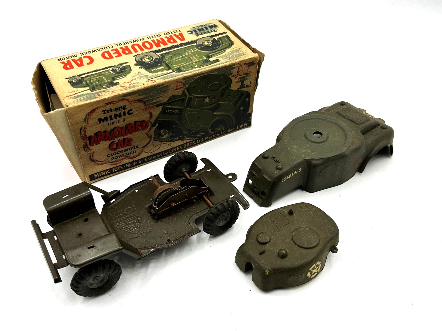 Tri-ang Minic, a boxed group of clockwork diecast models. The selection ...