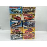 A boxed group of 1/25 MPC American car kits