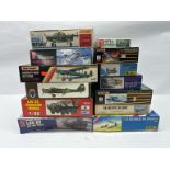 A boxed group of mixed-scale plastic model kits by various manufacturers