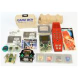 Assortment of vintage & modern handheld electronic games: