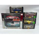 A boxed group of mixed scale die-cast models