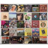 A collection of pop, country, and easy listening vinyl records featuring various vocal harmony an...