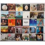 A selection of easy listening, country, and pop LPs featuring artists such as Bert Weedon, Ian Wh...