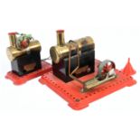 Mamod Live steam stationary workshop engines, mounted on Meccano plinths, have been fired. Condit...
