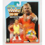 A vintage Hasbro WWF Series 3 Mr. Perfect carded figure. The wrestling action figu…