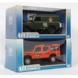 Universal Hobbies, a boxed 1:18 Scale Land Rover pair