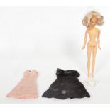 Flair Toys early Daisy Mary Quant doll. The blonde doll features curly rooted hair…