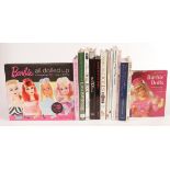 Doll-related reference books, a collection of fourteen doll reference and price gu…