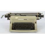 Olivetti LINEA 88 typewriter, presented in a light grey casing with a black keyboa…