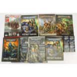 A collection of Games workshop & panini books, stickers, and large quantity of tra…