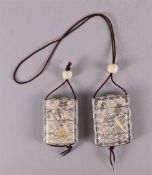 Twee diverse benen inro's met erotische voorstellingen, 20e eeuw, h 9 x b 7 cm, tot. 2x.