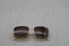 Gucci GG1018SK 004 Sunglasses, Frames Gold/Lenses Brown, No Case