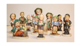 11 Hummel Little Boy Figurines