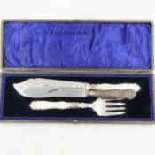 Cased Victorian mother of pearl and silver collared knife and fork set with further silver handled