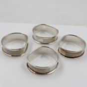 Set of four hallmarked silver napkin rings, Birmingham assay, combined 42g. UK P&P Group 2 (£24+