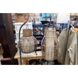 Pair of rattan and wicker floor lamps, 170cmH. Not available for in-house P&P