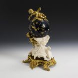 Französische Kaminuhr mit Sternenkugel und Putten.. AD. Mougin, Paris.