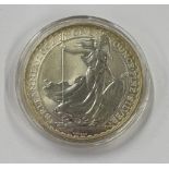 A 2002 fine silver Two Pound coin. Approx. 28 grams. Est. £30 - £40.