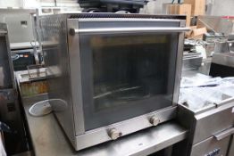 60cm electric bench top oven with a Breville toaster
