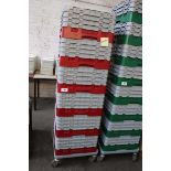+VAT Six glass washer trays containing a large quantity of assorted glassware on a four wheeled