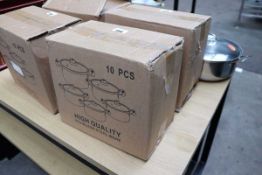 Ten piece stainless steel and glass lid pan set, boxed