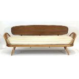 Lucien Ercolini for Ercol, an elm and beech sofa/daybed, with 'surfboard' back and curved spindled