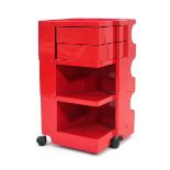 An Italian red 'Boby' trolley by Joe Columbo, impressed signature, h. 73.5 cm Top tray locked and