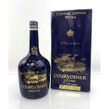 A Ceramic Decanter of Chateau Limoges Courvoisier Extra Fine Champagne Cognac with box & Certificate