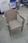 Pair of brown rattan garden armchairs