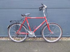 Peugeot red town bike