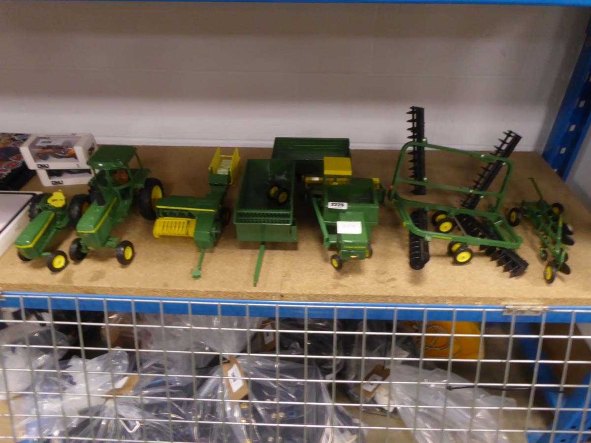 John Deere diecast model tractors and farm vehicles, plus accessories