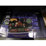 +VAT Build It mini figure display case with Hornby Santa's Express trainset